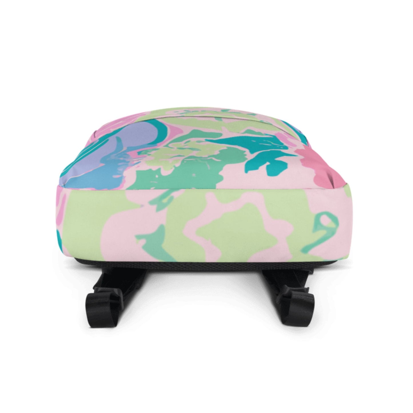A pink floral backpack - the bottom of the backpack is veing shown.