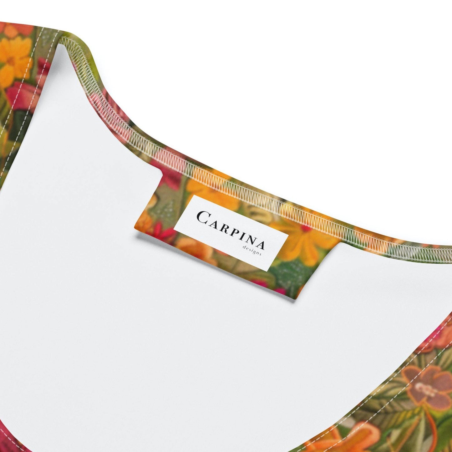 The "Carpina Design" label on the inside of the bodycon dress.