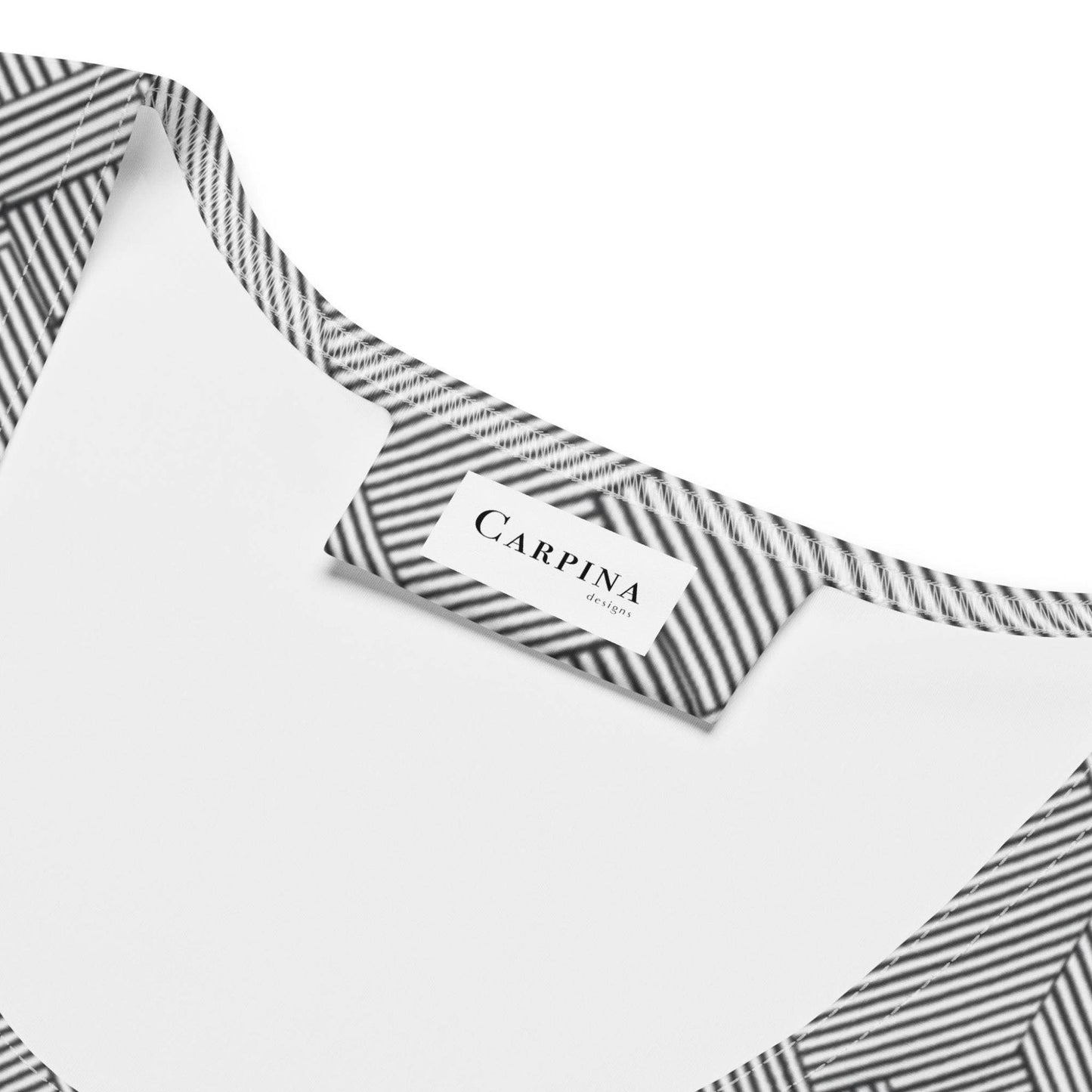 A grey bodycon dress with the "Carpina Designs" label.