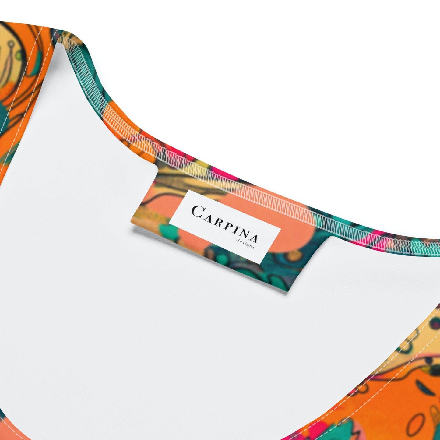 "Carpina Design" label on the inside of the tropical floral bodycon dress.
