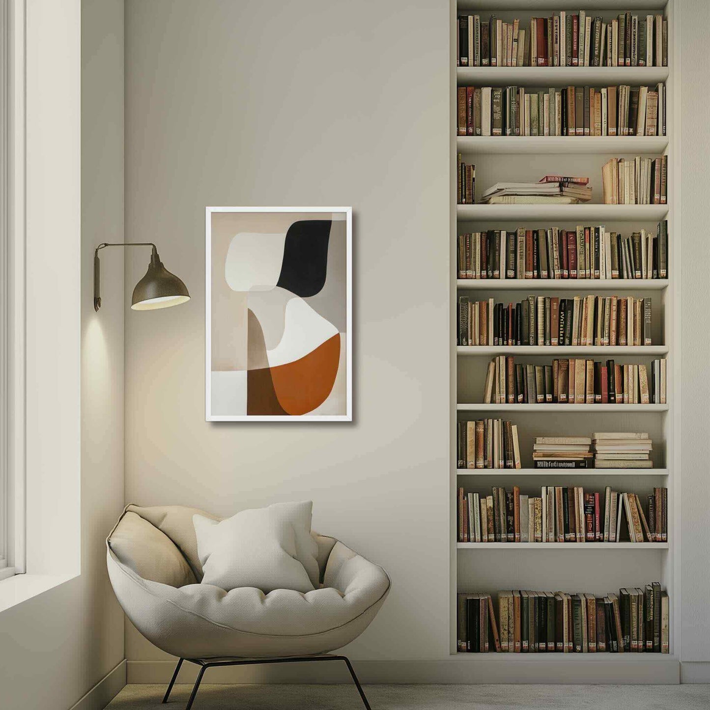 Discover "ORVAN," a sophisticated framed poster featuring elegant, organic abstract art in warm neutrals. Beige, cream, taupe, terracotta, rust, and black blend with smooth transitions, creating calming yet visually captivating piece. Framed in wood in white color. The framed poster hangs on a white wall in a clean cut study room with white book shelvings.