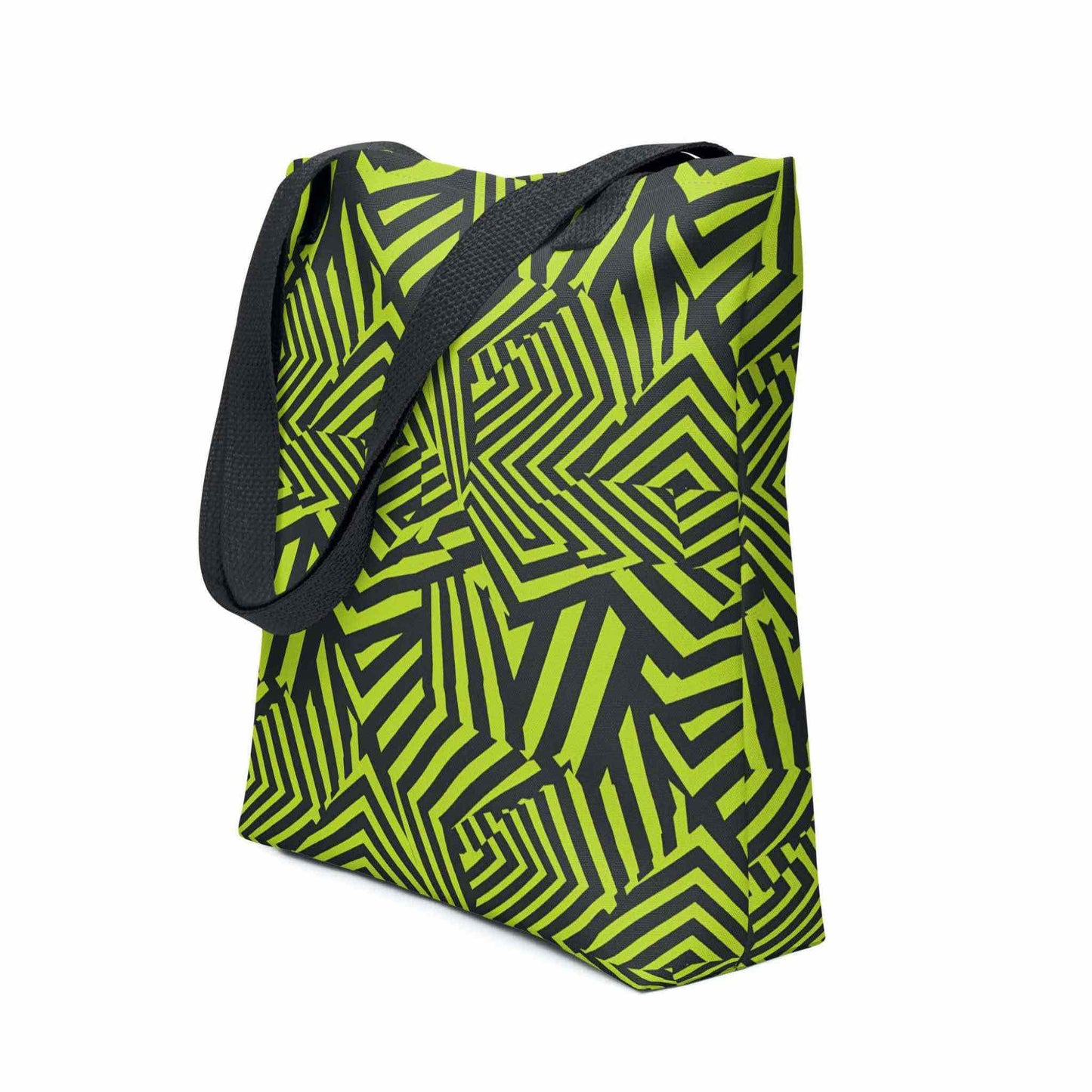 An avant garde tote bag with black handles, which features bold black and green op art illusion, shown in side view. Size is 15x15 inch. White background.