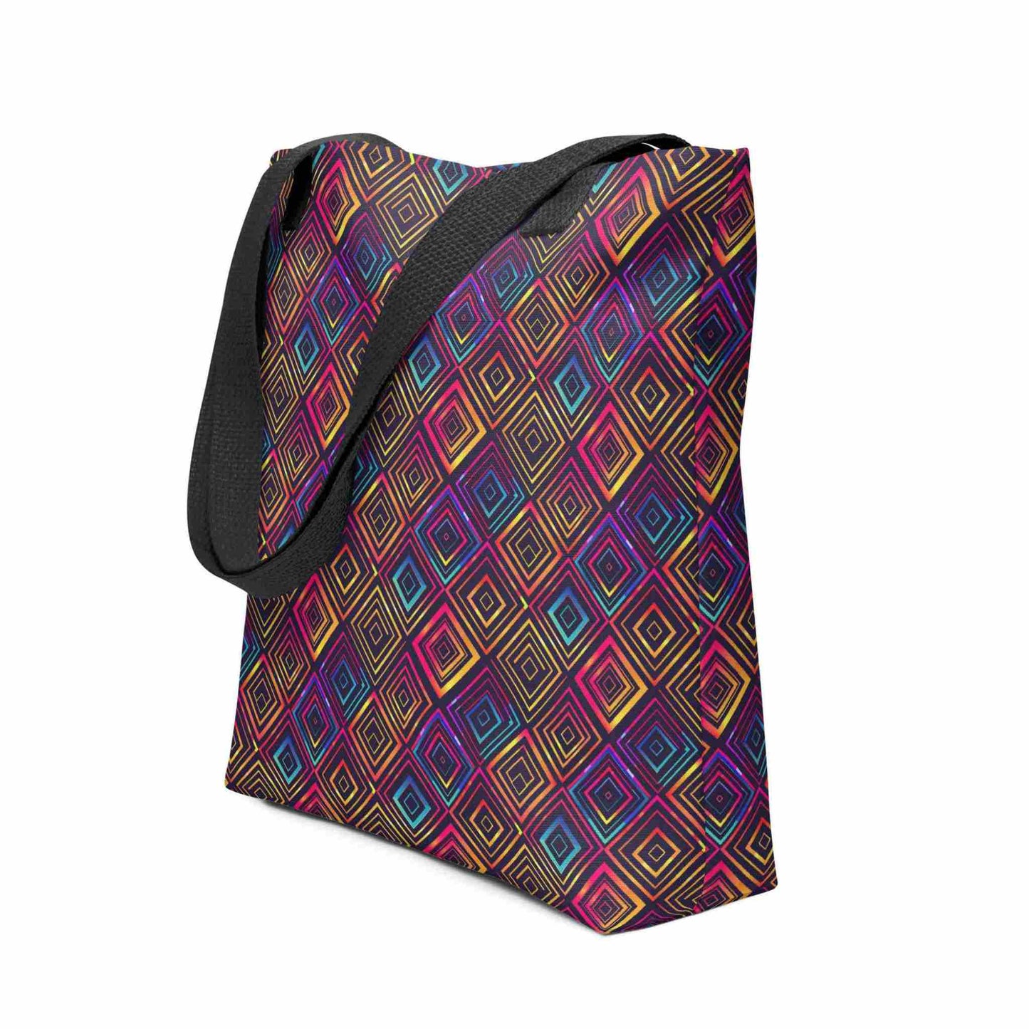 Fashion tote bag with black handles, which features a neon tapestry design in a sophisticated blend of colors, shown in side view. Dimension 15x15 inches. White background.