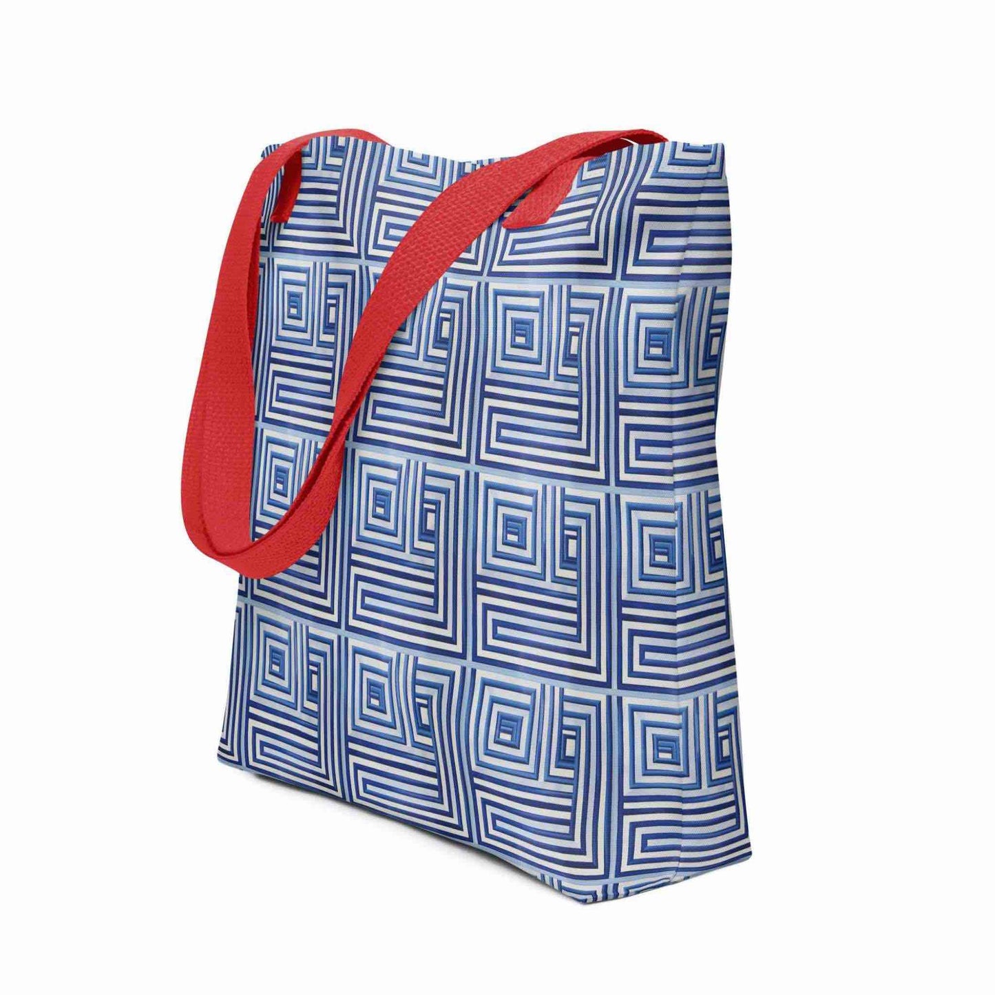 Blue op art tote with red handles, which features a blue op art illusion. Side view. White background.