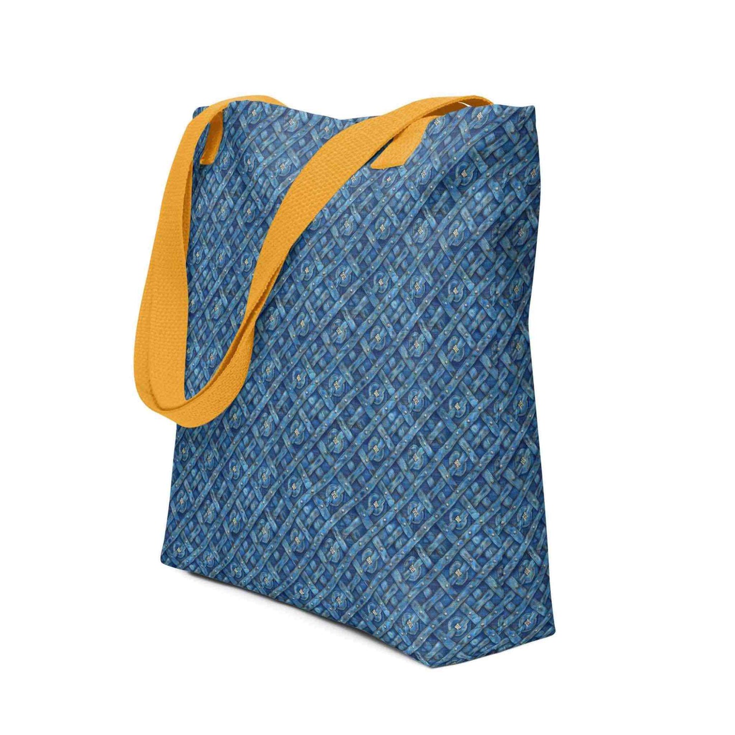 Blue tote bag with yellow handles, which features a blue Viking inspired denim pattern, shown in side view. Dimension 15x15 inches. White background.