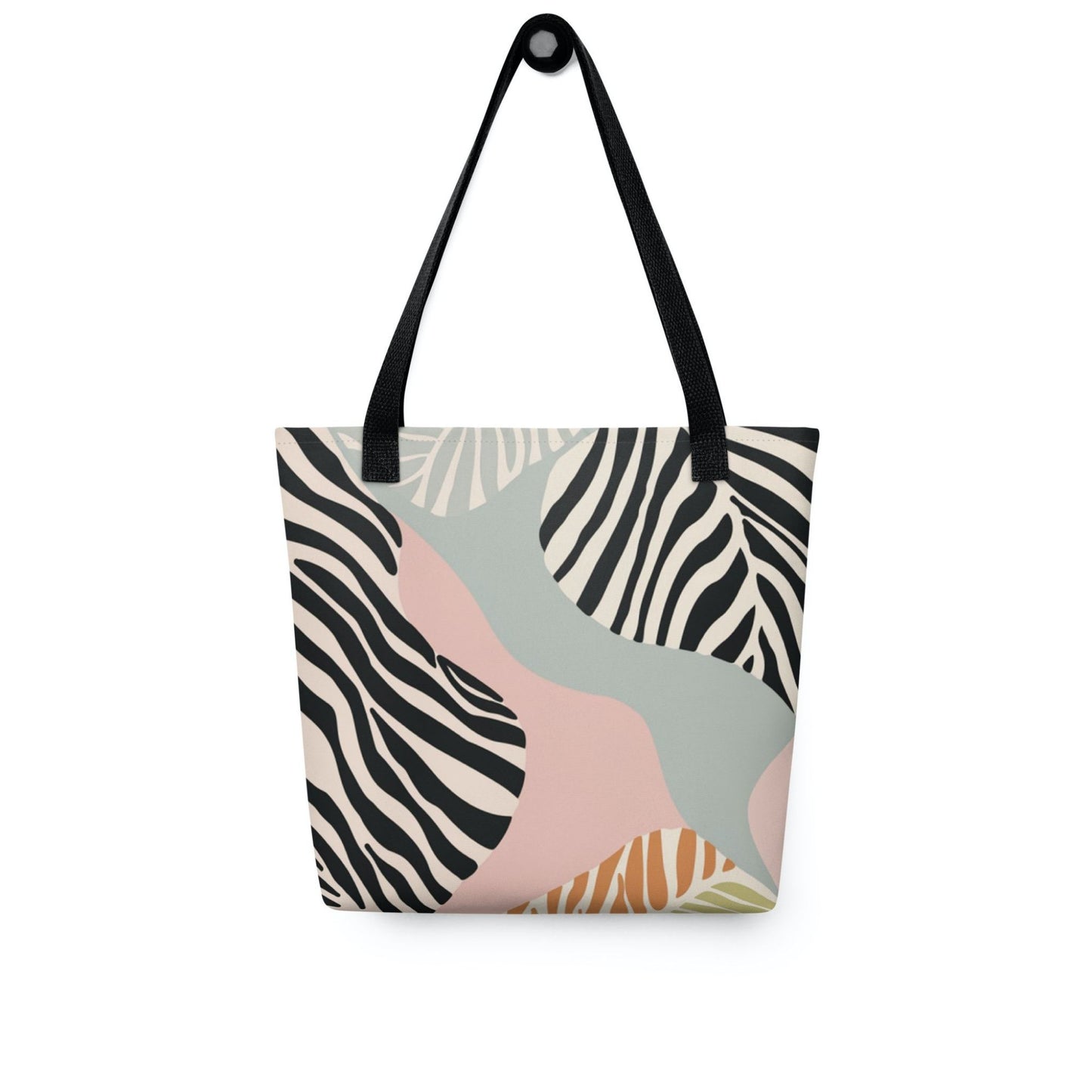 Zebra print tote bag with black handles, in a colourful and avant garde zebra inspired design, hanging on a white wall. Dimension 15x15 inches.