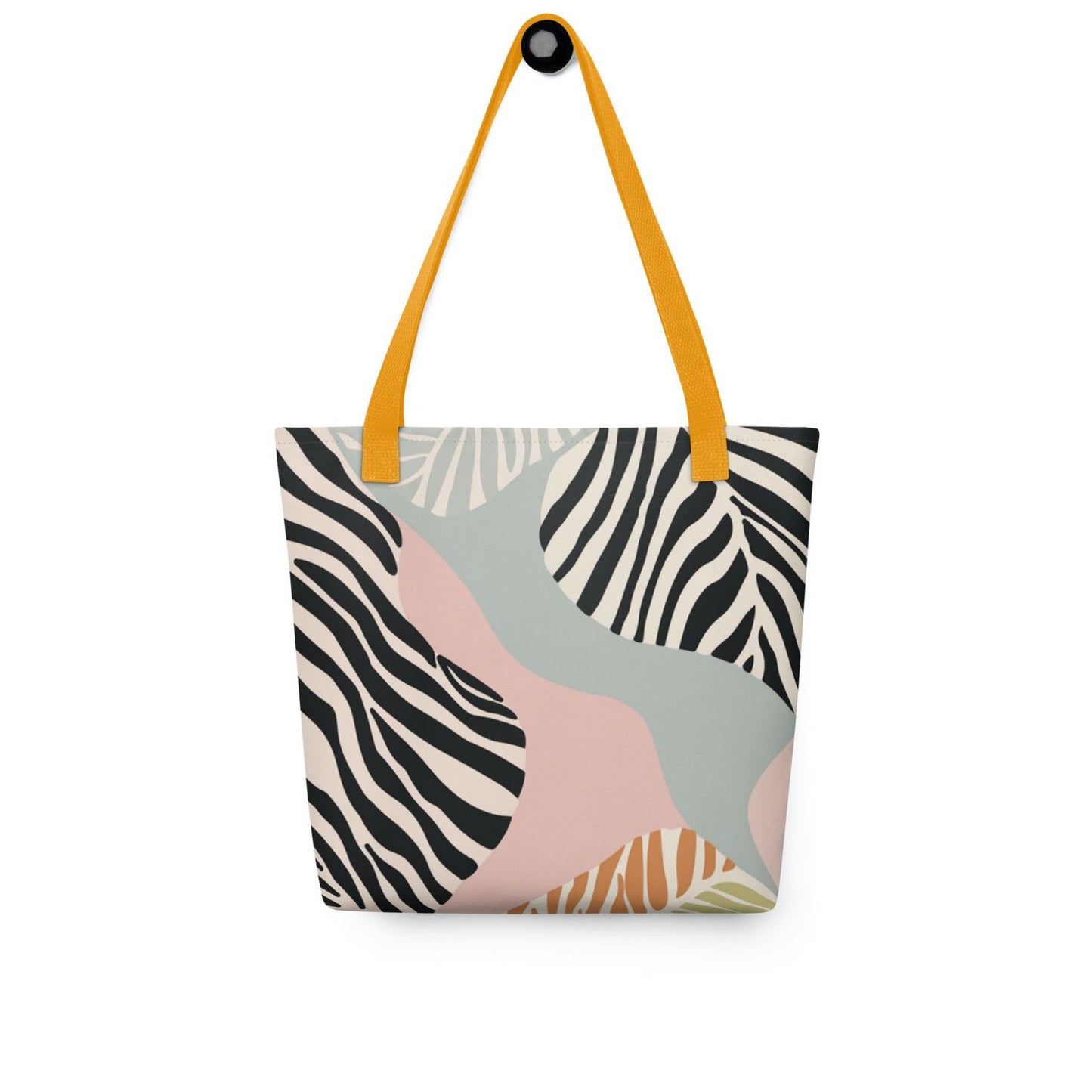 Zebra print tote bag with yellow handles, in a colourful and avant garde zebra inspired design, hanging on a white wall. Dimension 15x15 inches.