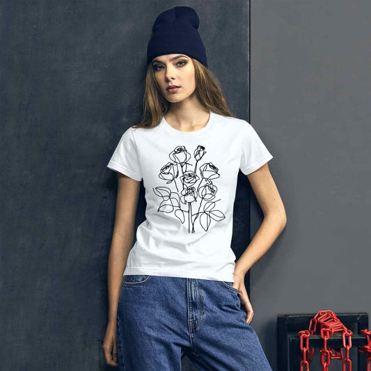 A trendy woman in a white fashion fit short sleeve cotton t-shirt with an elegant pencil sketch of a bouquet of roses.