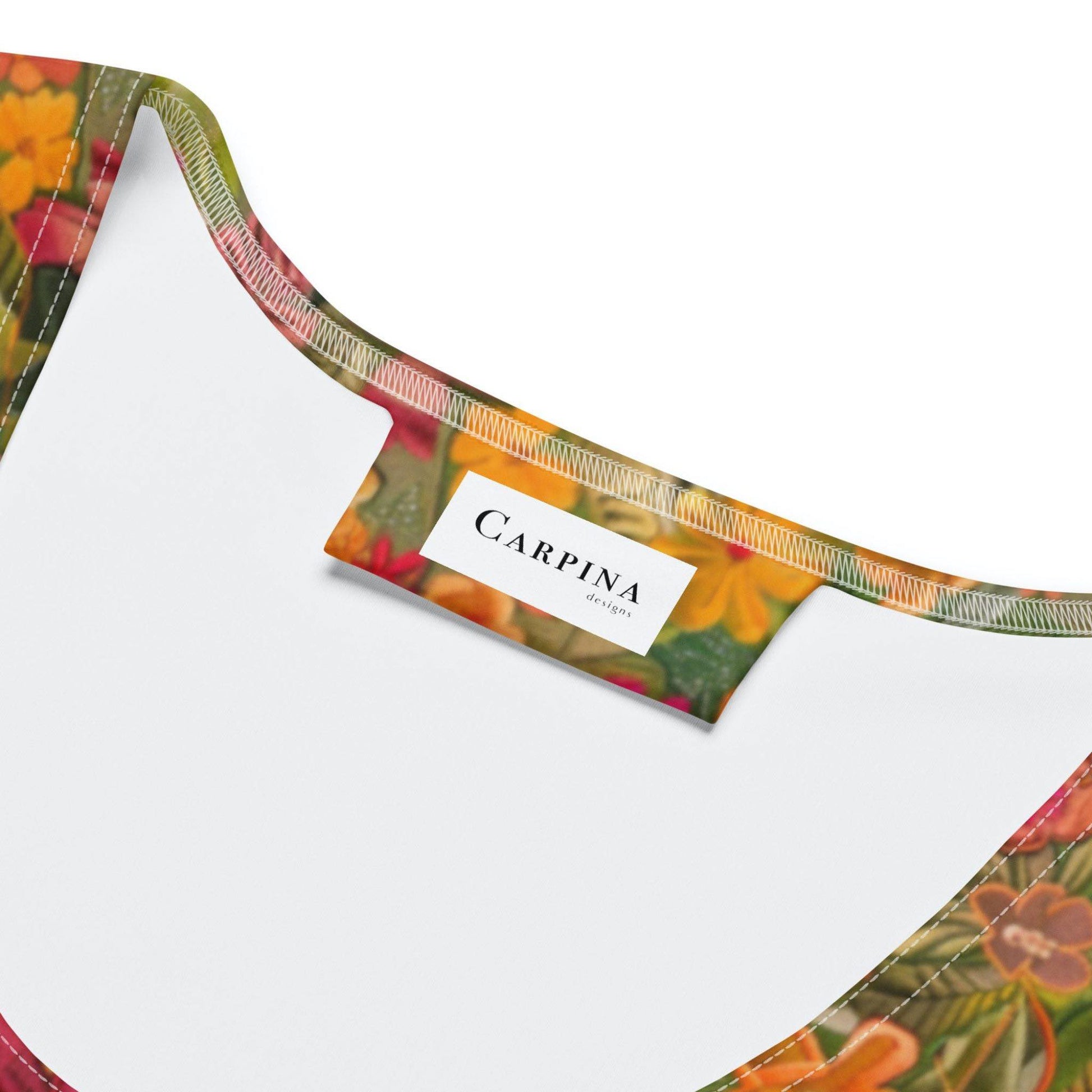 The "Carpina Design" label on the inside of the bodycon dress.