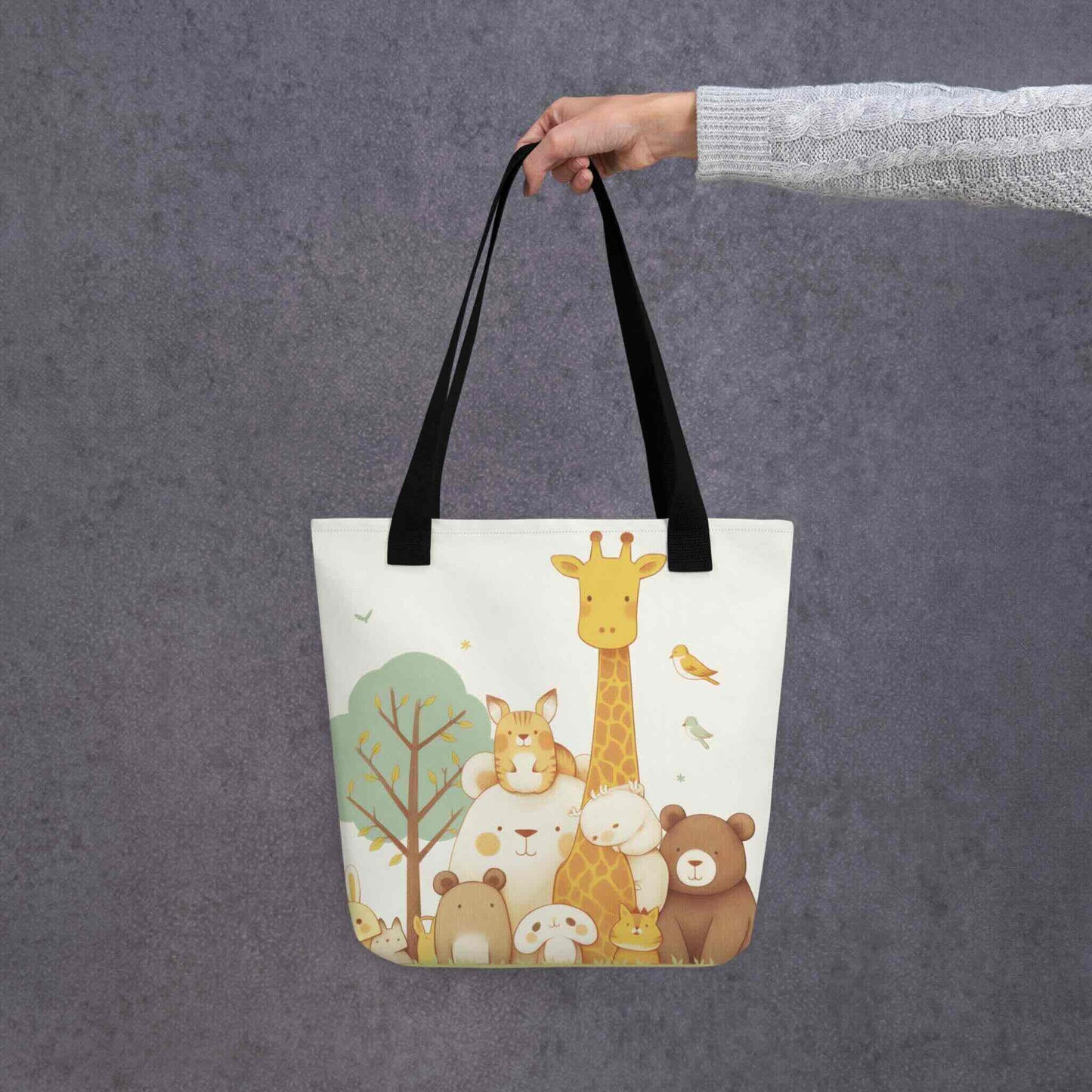 Cute tote bag featuring a stylish
gathering of our sweet animal villagers, with black handles, held in a hand against a grey background.