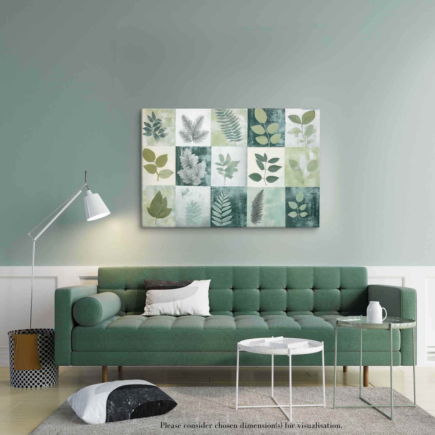 Discover "PHOTOTYPE17," a landscape canvas print showcasing a mesmerizing green botanical cyanotype collage. This unique artwork features an artistic grid of striking leaves. Experience the serene yet scientific beauty of this modern herbarium-inspired piece. Perfect for adding a touch of natural sophistication to your space. The canvas print hangs on a wall over a green sofa in a modern living room with white coffee table and white lamp.