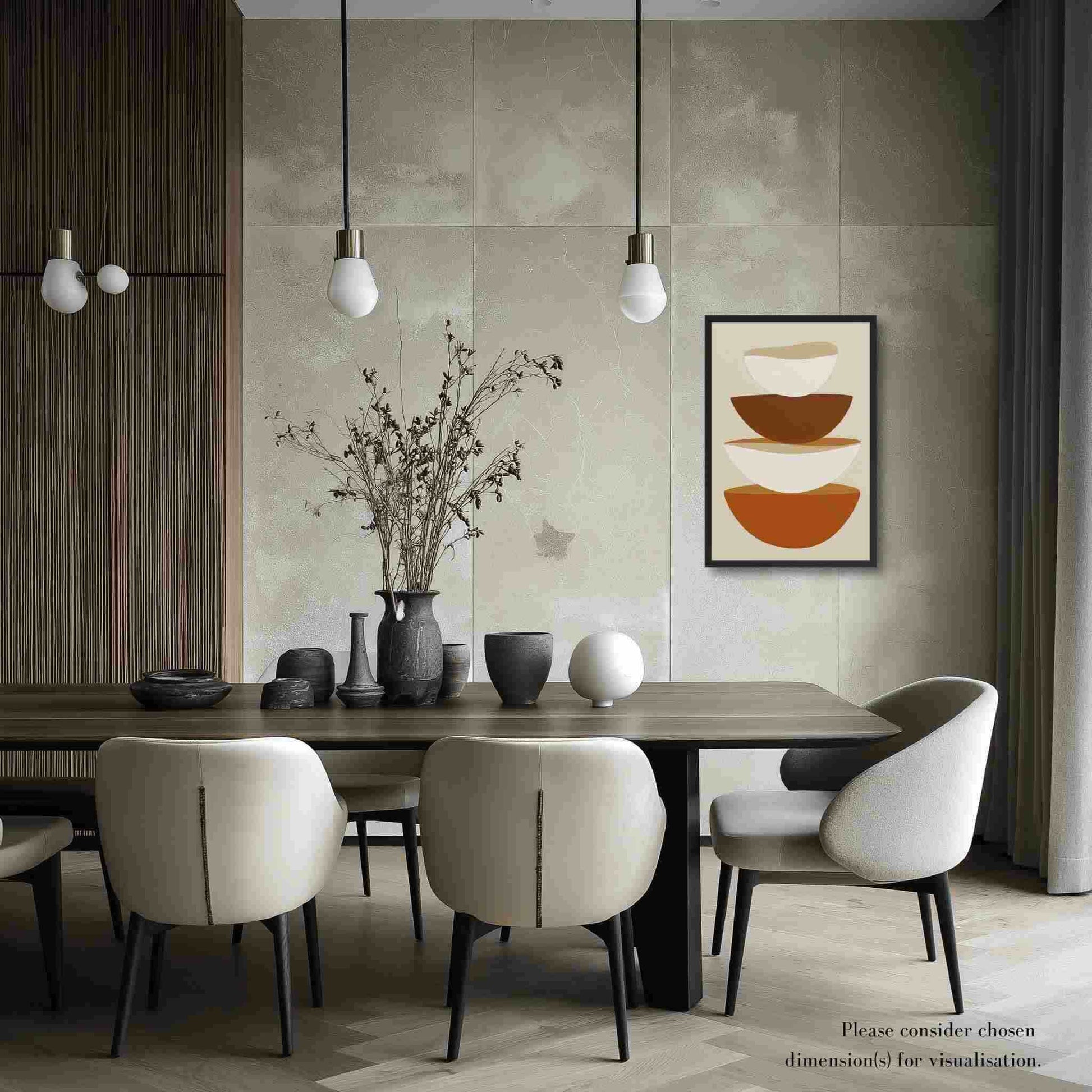 A minimalist abstract art form in framed poster, featuring stacked bowls in warm earthy tones on soft biege, its clean, contemporary, and slightly rustic aesthetic adds a touch of calm sophistication to your kitchen or dining area.  Framed in wood in black color. The poster hangs on a biege wall near a large dining table in a contemporary modern setting.