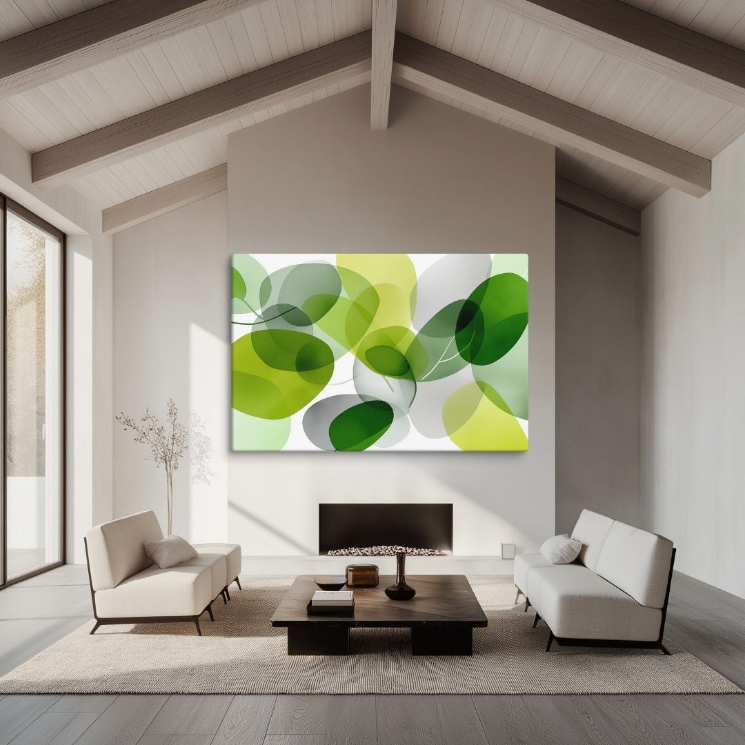 Illustration of a modern botanical artwork features layered, translucent green and chartreuse organic shapes for a lush, sophisticated feel on canvas, hanging in living room over a seating area.