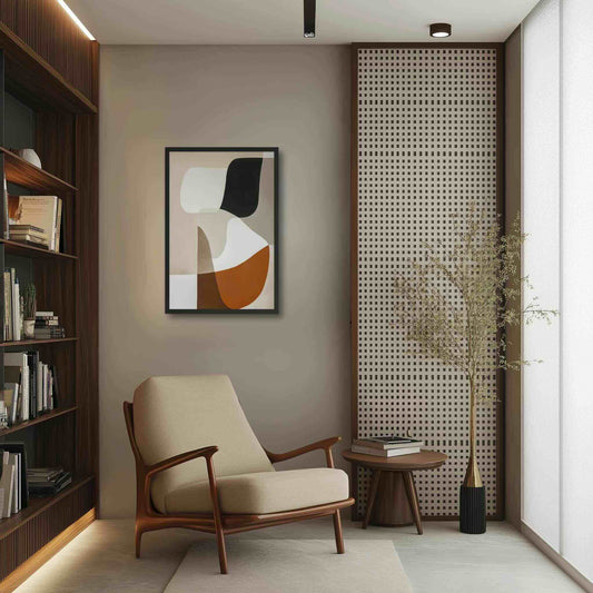 Discover "ORVAN," a sophisticated framed poster featuring elegant, organic abstract art in warm neutrals. Beige, cream, taupe, terracotta, rust, and black blend with smooth transitions, creating calming yet visually captivating piece. Framed in wood in black color. The framed poster hangs on a biege wall in the reading corner of an elegant modern study room.
