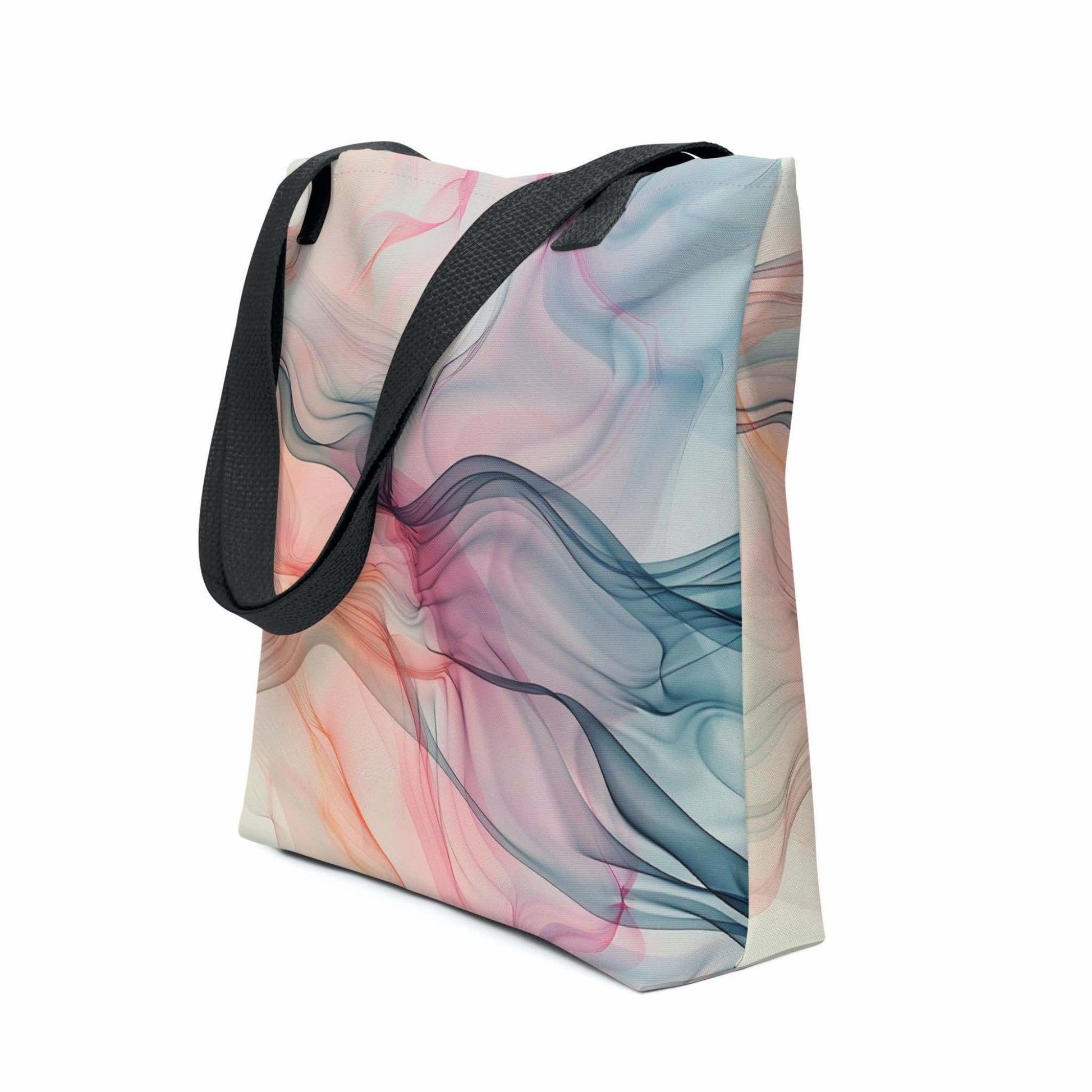 Side view of a 15x15 inch tote bag with black handles, which design is an abstract art of artistic wavy bluish and pastel lines. White background.