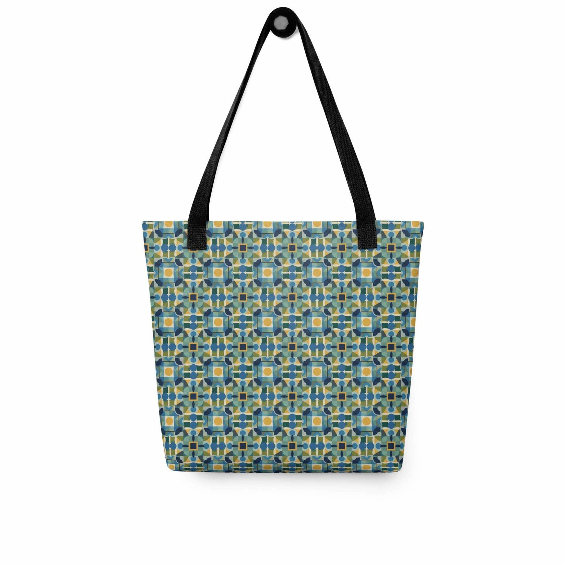 Elevate your style with the TILEWAVE Abstract Tote Bag, featuring a vibrant geometric tile pattern in modern retro hues. Perfect for daily essentials, this 15" x 15" polyester tote bag combines playful structure with sophisticated charm. Black handle. White background.