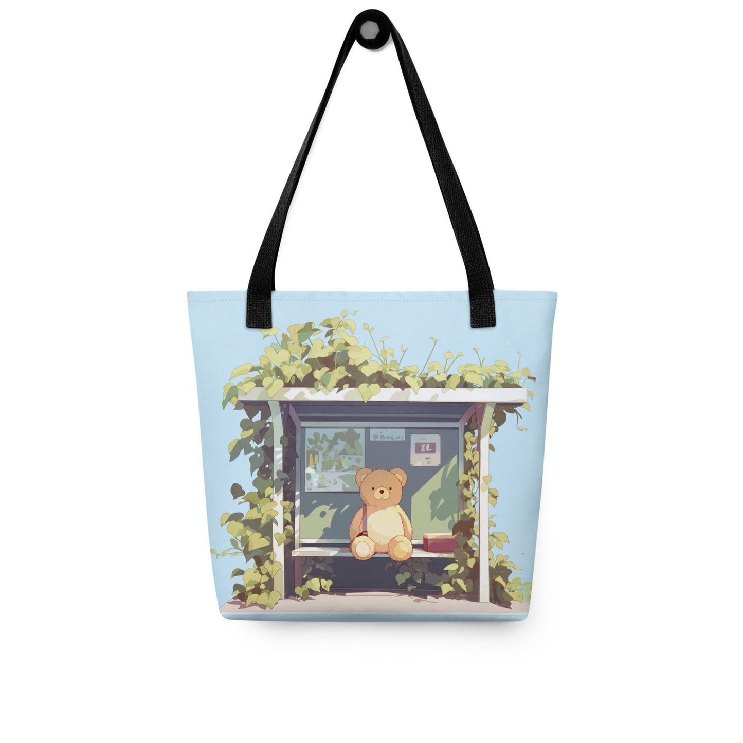 Teddy Bear Tote Bag which features a cute teddy bear waiting sweetly at the bus-stop, in a charming, tranquil setting in nature, with green and mint tulip colors. Black handles. Dimension 15x15 inch polyester. White background.