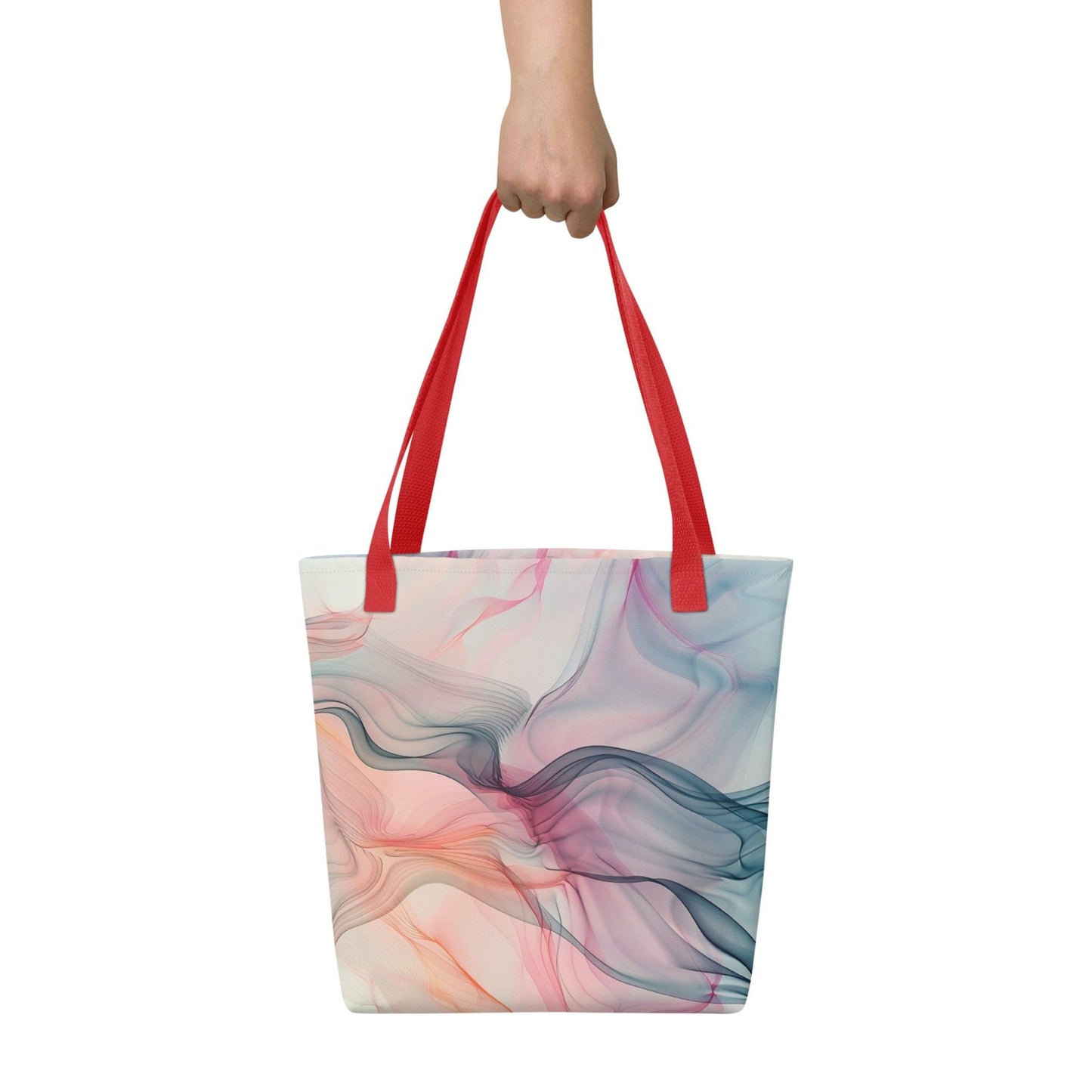 A 15x15 inch tote bag with red handles, which design is an abstract art of artistic wavy bluish and pastel lines, held by a lady's hand. White background.