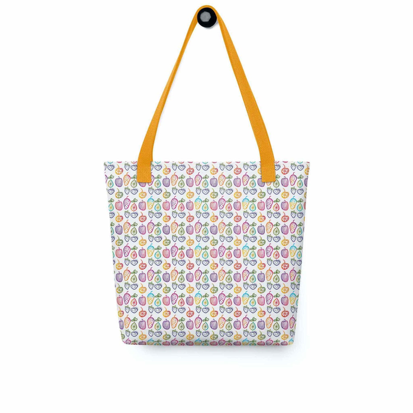 A 15x15 inch tote bag with yellow handles, which features colourful cheerful doodles of fruits in a crisp white background, hanging on a wall hook. White background.