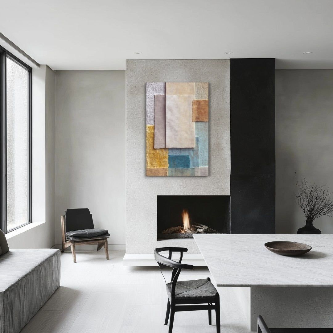 Abstract paper collage art in sage, ochre, and stone tones with layered parchment textures, styled in a dining room with fireplace, GRACE by Carpina Designs