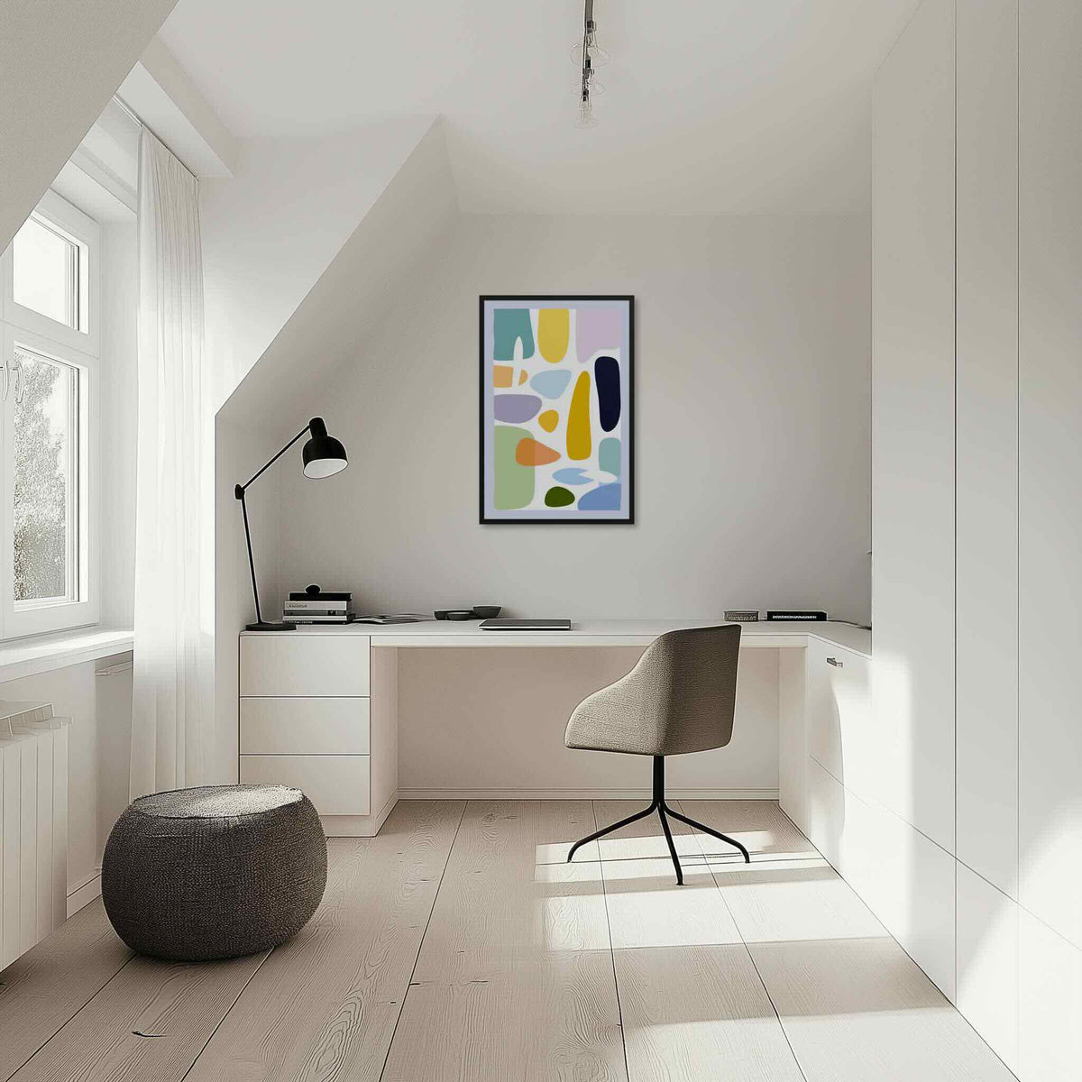 Mid century modern wall art with soft organic shapes in mint green, lavender, butter yellow, peach and terracotta on cream backdrop, styled in a bright attic home office with slanted ceiling and natural light, HUES by Carpina Designs
