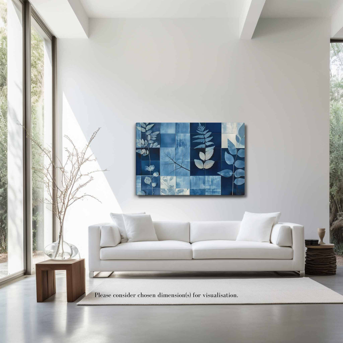 Cyanotype collage with white leaf silhouettes against rich indigo and navy blues in a modern grid, styled in a bright minimalist living room with floor-to-ceiling windows and white sofa, PHOTOTYPE by Carpina Designs