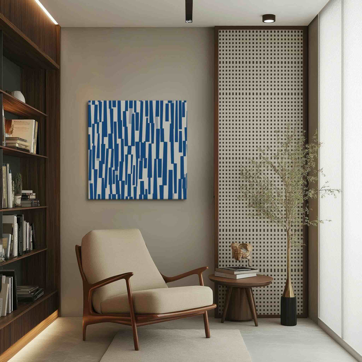 Blue and cream canvas art with rhythmic cascade of deep navy shapes against warm neutral backdrop of a beige neutral reading room with wood shelves, STACCATO by Carpina Designs