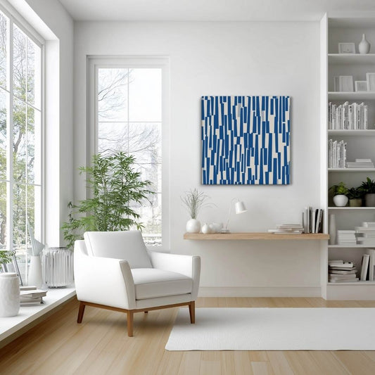 Blue and cream canvas art with rhythmic cascade of deep navy shapes against a white clean cut contemporary living room. STACCATO by Carpina Designs